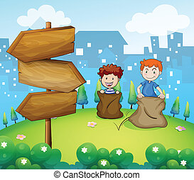 Vector of Sack race - Illustration of a sack race between two young