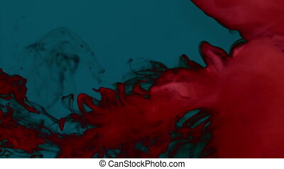 Carmine red smoke on plain dark background. Carmine red smoke on a plain  dark blue background, creating volutes and swirls, | CanStock