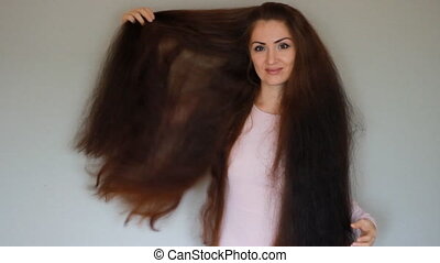 Beautiful woman with very long hair. hairstyle. | CanStock