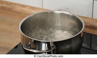 boiling salt water in a pot